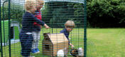 The low enclosure is high enough for small children to stand upright in.