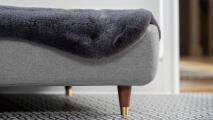 Topology dog bed detail with brass capped legs