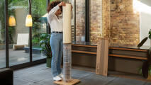 Woman easily swapping out the sleeves on her Switch cat scratcher