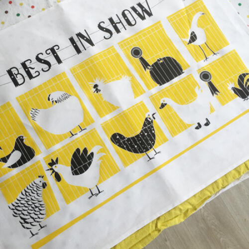 Yellow best in show tea towel