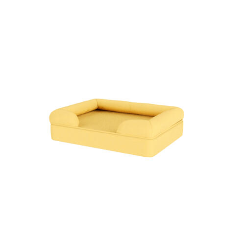 A yellow dog bed.