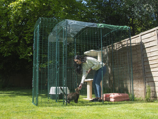 The porch for the outdoor cat run lets you enter without worrying about escapees!