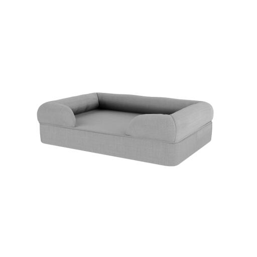 A grey memory foam bolster dog bed.