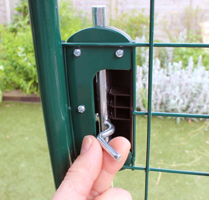 You can lock and unlock the door from inside the Outdoor Guinea Pig Run.